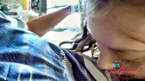 Elena Koshka in plaid shirt, side profile with long hair