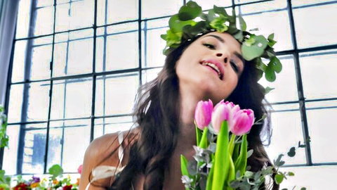 Melody Marks with pink tulips and leafy crown, seductive smile in white lingerie