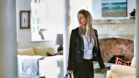 Busty blonde MILF in black blazer and skirt, amateur office tease