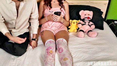 Redhead in pink lingerie and thigh-highs teases older man with plushies