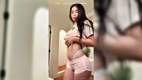 Aishah Sofey busty Asian teen posing in crop top and pink shorts