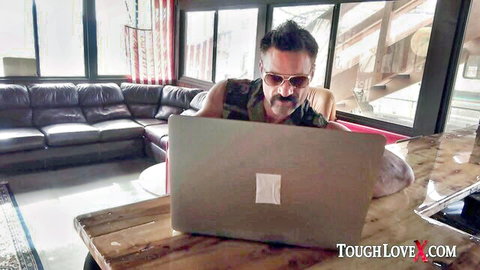 Horny priest in sunglasses at desk with laptop, from Ella Knox teen fuck video
