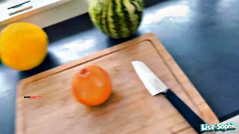 Lisa-Sophie in playful kitchen tease with fruits before creampie fisting