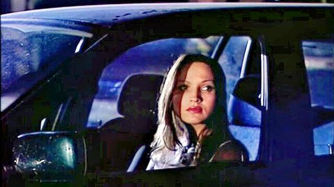 Luana Borgia Italian MILF in car, seductive brunette gaze