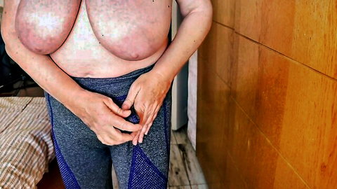 Topless mature MILF with massive saggy tits fingers pussy through tight gray leggings