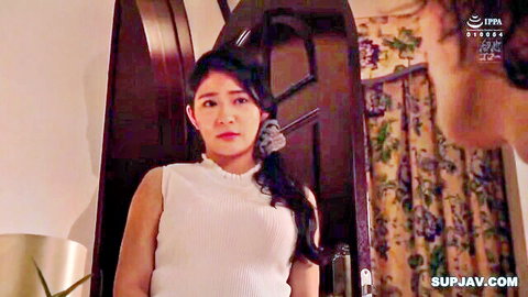 Megu Fujiura in white sleeveless top, ponytail, standing by door in JAV scene
