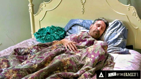 Handsome DILF stepdad lying asleep in bed for taboo family fuck