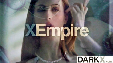 Slim redhead beauty seductively posed for DarkX spitroast threesome