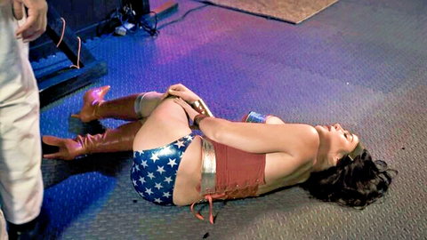 Blair Williams as bound Wonder Woman in sexy cosplay bondage scene
