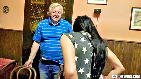 Eveline Dellai chats intimately with older man from behind