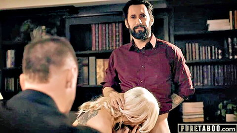 Bearded man grabs blonde wife's hair pulling her mouth to his crotch while cuckold husband watches