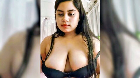 Curvy Indian babe with huge tits spilling from black bra cleavage selfie