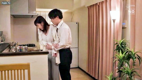 Busty Japanese wife Sayaka with curves in kitchen with colleague