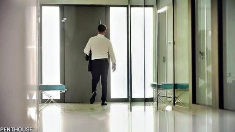 Shalina Devine office encounter: suited man entering modern suite