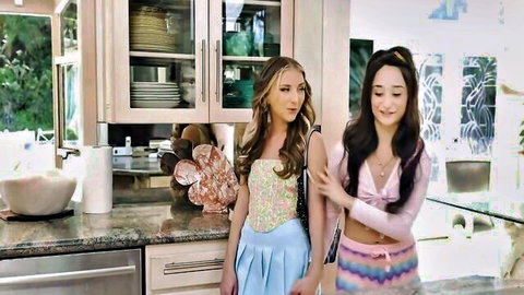 Two Sapphic lovers in crop tops and mini skirts posing closely in intimate embrace