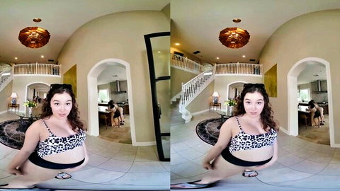 Young brunette in leopard bikini spreads legs wide on floor teasing POV