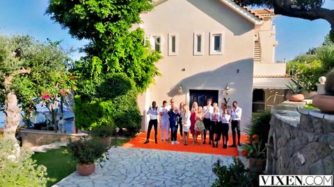 Vixen pornstars in elegant suits and dresses posing on red carpet at luxury villa
