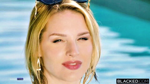 Blonde stunner Bonni Gee teases by the pool in Blacked scene