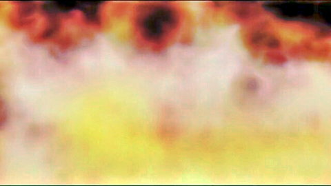 Blurry fiery scene from vintage Italian adult film Faust
