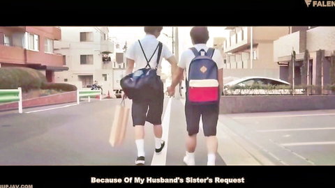 Two Japanese schoolboys in uniforms holding hands walking down urban street