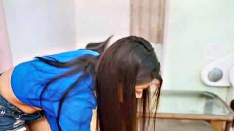 South Asian babe bends over in tiny denim shorts exposing juicy ass cheeks