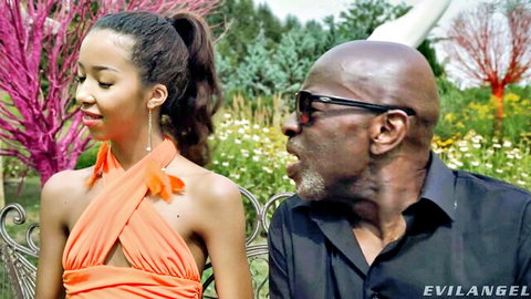 Ebony beauty in orange dress with Rocco Siffredi outdoors, Evil Angel scene