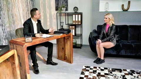 David Perry interviews busty blonde in office before anal doggie