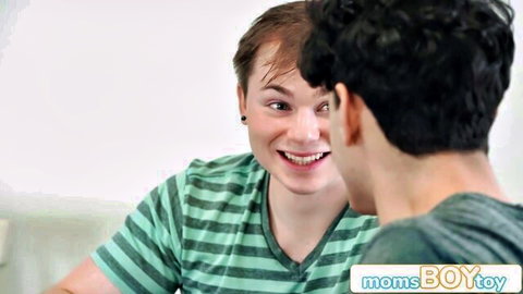 Crystal Clark MILF smiling intimately with young man in green striped shirt