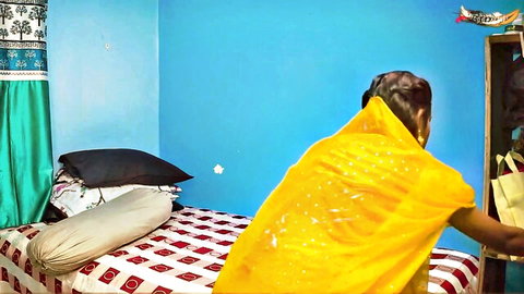 Sexy Indian housewife in shiny yellow saree bending over bed teasing doggy style pussy