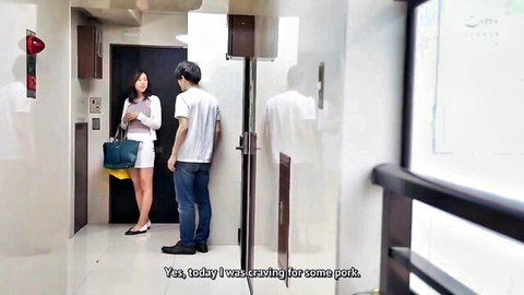 Japanese brunette MILF in short skirt and heels flirts with guy in hallway craving his cock