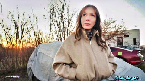 Paola Guerra seductive in beige coat, outdoor PublicAgent sunset scene