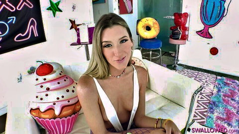 Addison Vodka in low-cut white dress, teasing big cleavage with cupcake prop
