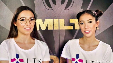 Two sexy brunettes in Evil Angel tees smiling for Rocco Siffredi threesome