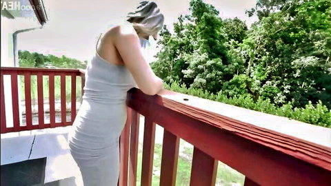 Nikki Brooks in tight dress leaning on balcony, POV anal step-mom tease