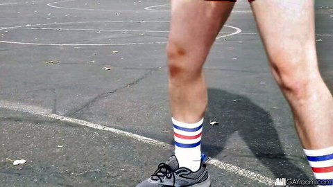 Thick trans athlete legs in American flag socks on basketball court