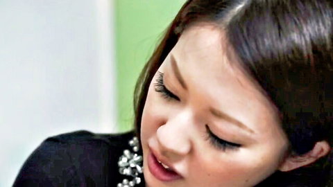 Seductive Japanese beauty with glossy parted lips and heavy lashes teasing for cock sucking