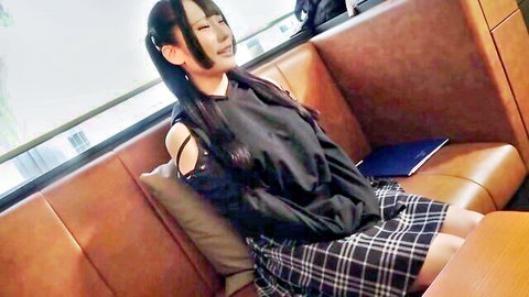 18-year-old Japanese girl in plaid skirt and off-shoulder top posing cutely