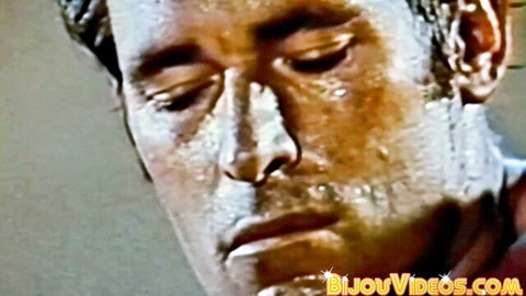 Vintage muscle man in sweaty ecstasy during gay deepthroat scene