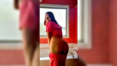 Curvy Latina nurse in pink crop top pulls down pants, teasing big ass in JOI video
