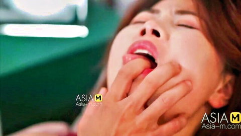 Petite East Asian babe eyes closed ecstasy as rough hand fingers fuck her open mouth tongue