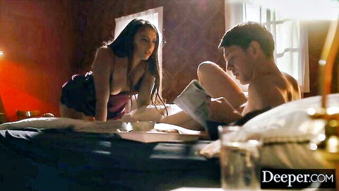 Gia Derza in sexy lingerie bent over bed with man in bedroom scene