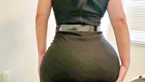 Crystal Lust in tight black dress, showcasing her big round ass from behind