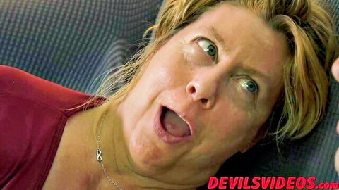 Penny Sue blonde with wide open mouth in ecstasy during domination scene