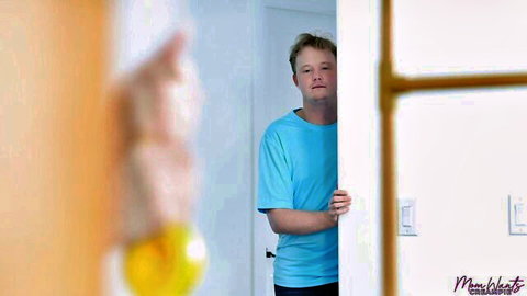 Stepmom's hand offers lemon to peeking stepson in blue shirt