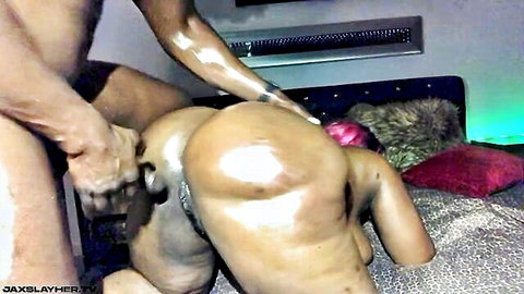 Thick ebony babe with huge ass gets fucked doggy style by muscular BBC gripping her wet pussy.