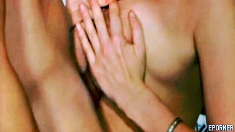 Vintage MILF hand caressing nude man's chest in hot porn scene