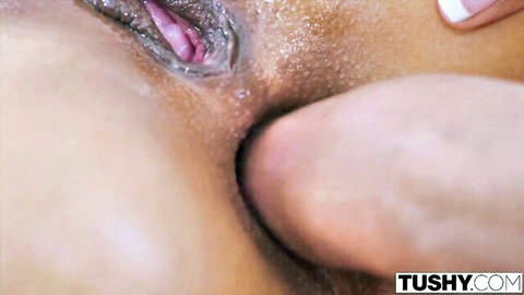 Close-up of fingers deeply penetrating spread wet gaping pussy