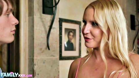 Vanessa Cage in pink lingerie smiling at Spikey Dee in seductive scene