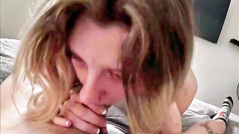 Blonde woman in POV cowgirl ride, intense close-up expression