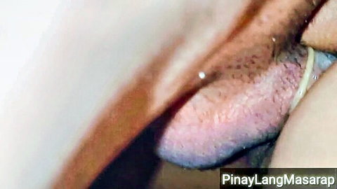Close-up of wet Pinay pussy, soaked and aroused from cousin fuck